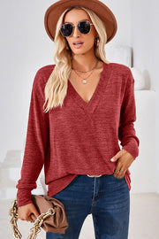 Relaxed V-neck tunic top in Rust with long sleeves and a heathered texture.