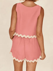 Coral scallop trim outfit set with sleeveless top and shorts.
