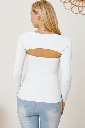 White long sleeve bodysuit with open back detail