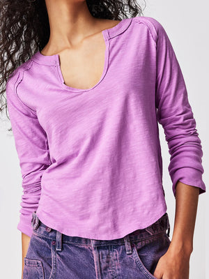 Lilac distressed slouchy long sleeve tee with a plunging neckline and raw edge details.