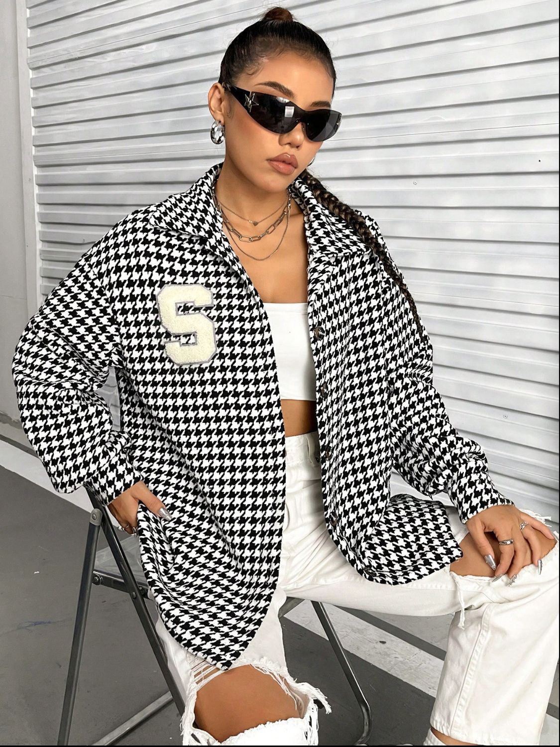 Houndstooth overshirt in black and white with a varsity patch detail.