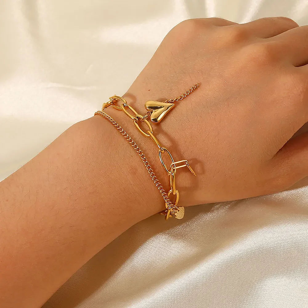 Gold layered chain bracelet with heart charms, 18K gold-plated