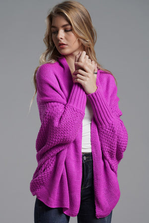 Fuchsia batwing knit cardigan with drape front and textured sleeves.
