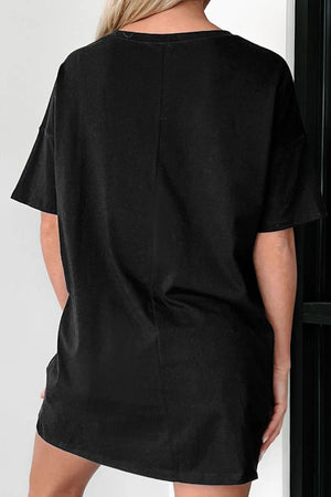 Black graphic t-shirt with checkerboard helmet detail, short sleeves, crew neck, casual fit.