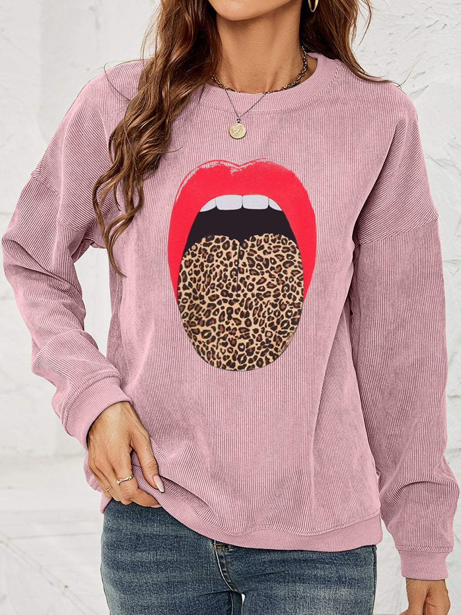 Dusty Pink corduroy crewneck sweatshirt with a red lip and leopard print tongue graphic.