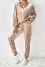 Tan velvet tracksuit joggers with zip front jacket and elastic cuffs.