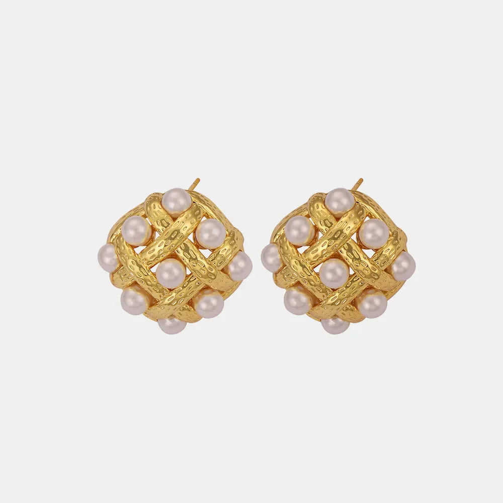 Gold woven pearl grid earrings with textured metal and pearl accents.