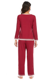 Wine long sleeve pajama set with white trim and contrast stitching.