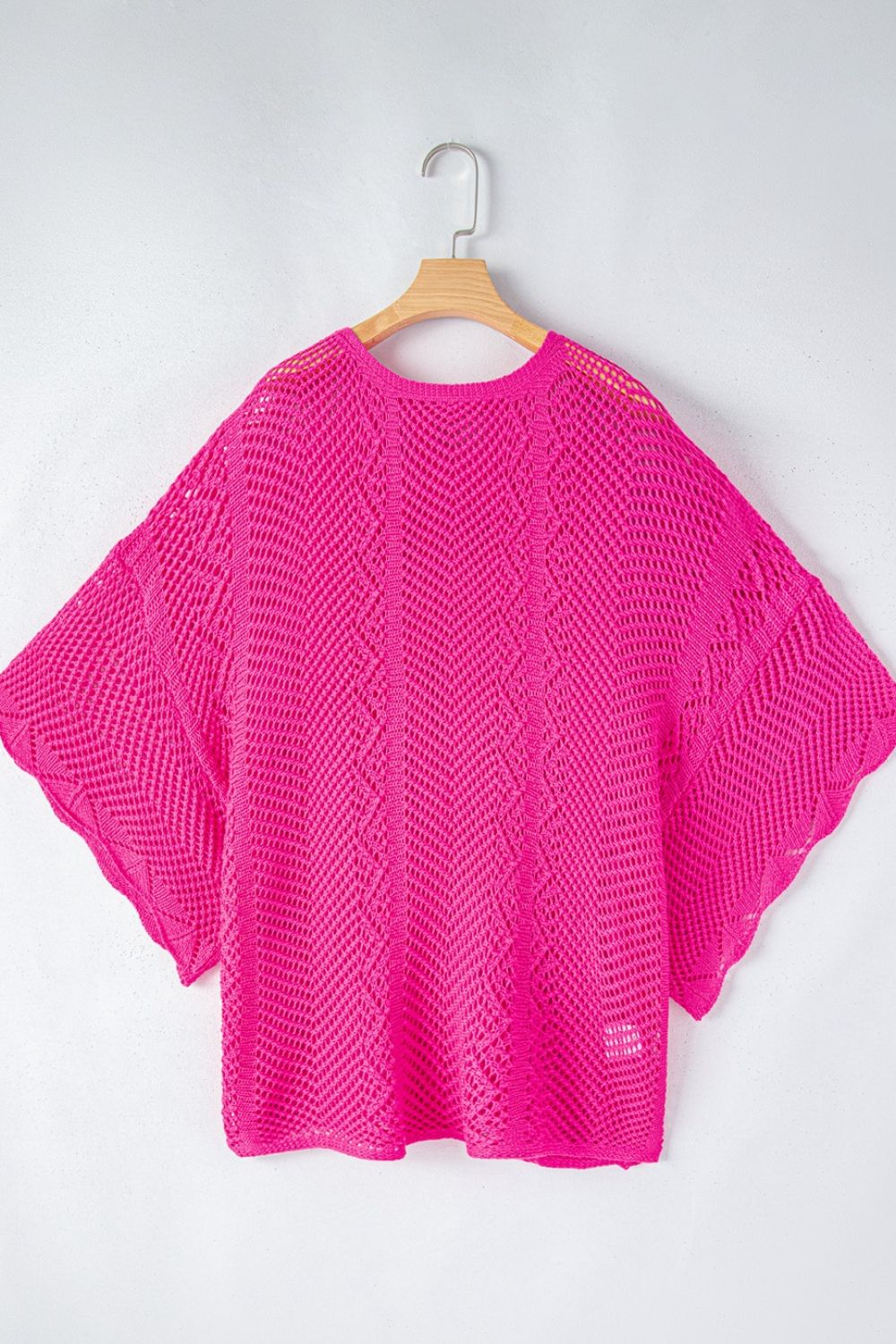 Hot pink open-knit chevron sleeve top with wide, flowing sleeves.
