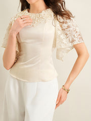 Apricot lace trimmed short-sleeve blouse with floral lace neckline and sleeves.