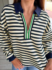 Striped long sleeve top with contrast collar and green zipper detail
