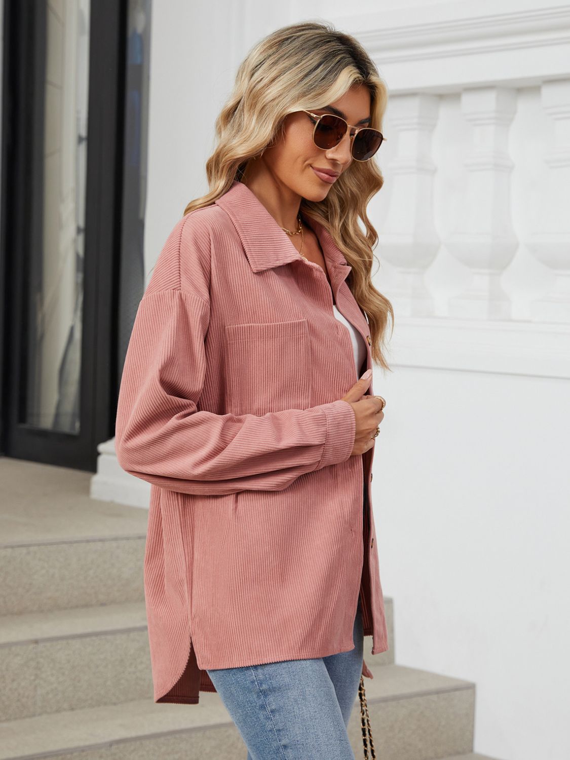 Dusty pink corduroy overshirt with buttoned chest pocket and relaxed fit