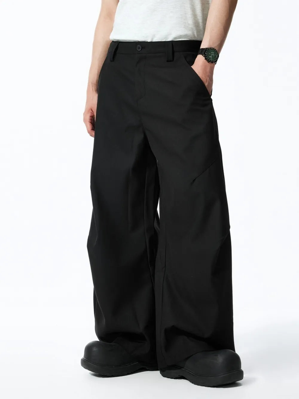 Black relaxed fit oversized men's sweatpants with a wide leg and pockets.