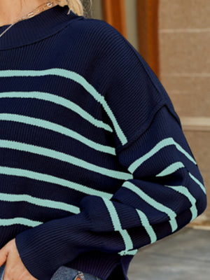 Navy and pastel blue striped acrylic knit sweater with balloon sleeves.