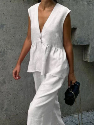 White sleeveless peplum top and wide-leg pants set, cotton blend, v-neck, casual women's outfit.