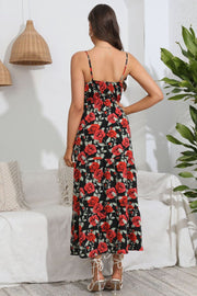 Floral print maxi dress with spaghetti straps and tiered skirt.