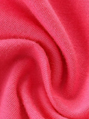 Close-up of pink cotton knit fabric with soft texture
