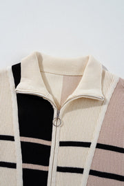 Colorblock ribbed zip-neck mini dress in beige, black, and terracotta with a polo collar.