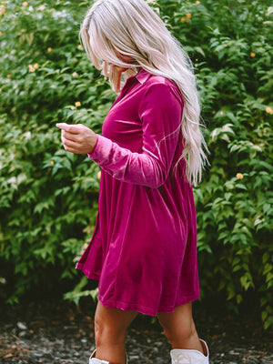Deep Rose velvet babydoll button-down mini dress with long sleeves.