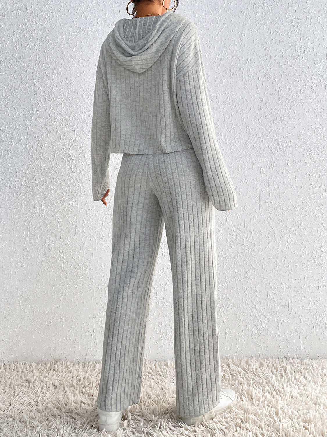 Light gray ribbed knit cropped hoodie and wide leg pants set.