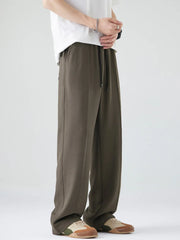 Dark brown casual drawstring sweatpants with a relaxed fit and clean seams.