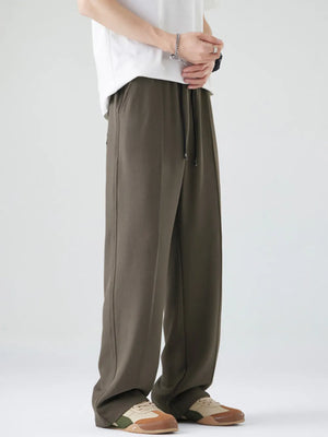 Dark brown casual drawstring sweatpants with a relaxed fit and clean seams.