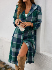 Checked plaid hooded duster coat in dark green with button front and side slit.