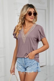 Mauve v-neck flutter sleeve blouse with lace trim detail