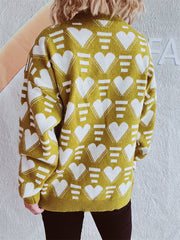 Mustard acrylic knit jumper with all-over white geometric heart pattern.