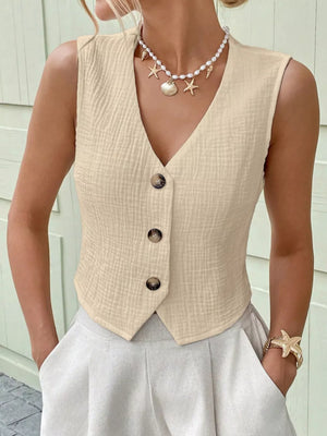 Apricot textured cotton button vest with V-neck and cropped length.