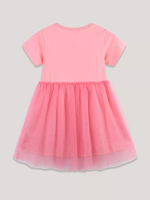 Pink baby dress with short sleeves and a layered tulle skirt.