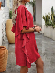 Red mini dress with ruffled sleeves and V-neck, casual style.