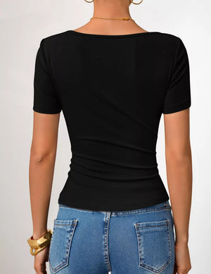 Black asymmetrical fitted maternity t-shirt with short sleeves and a scoop neckline.