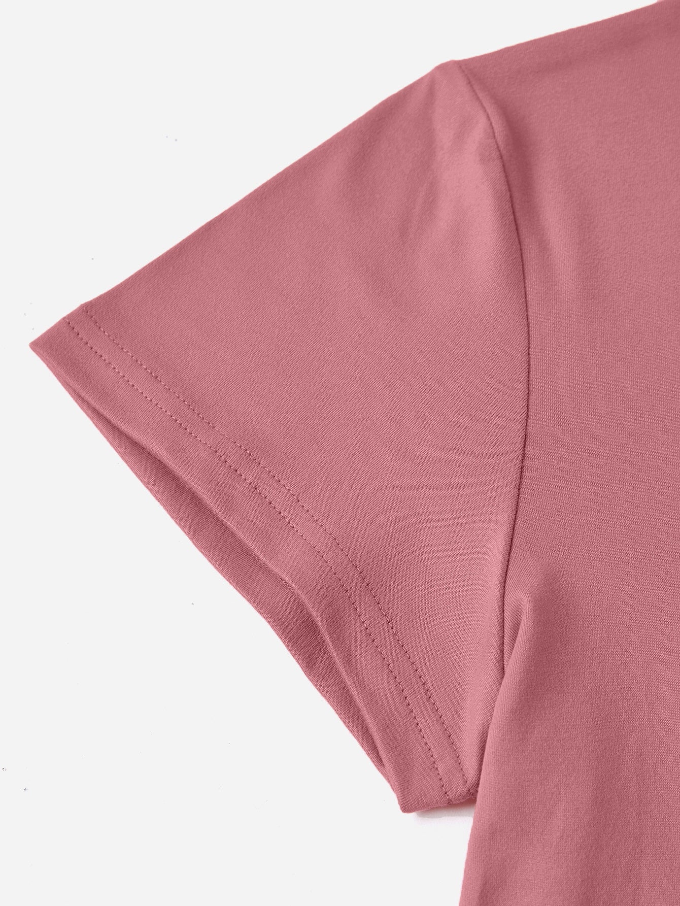 Dusty Pink t-shirt with short sleeves and double-stitched hem detail.