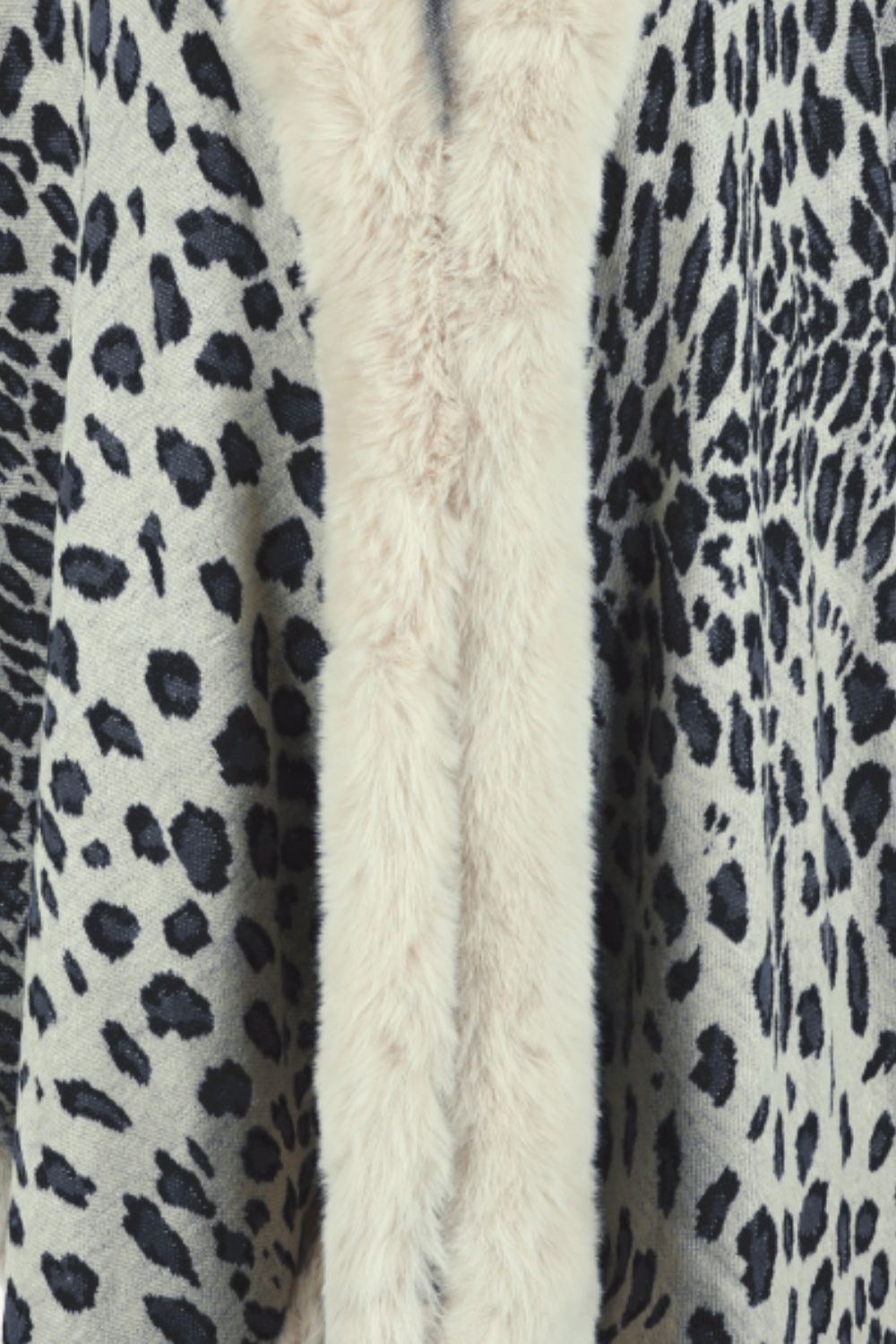 Leopard print cape with cream faux fur trim detail