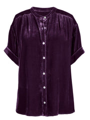 Velvet mandarin collar button-down top in plum purple with short sleeves and gathered shoulders.