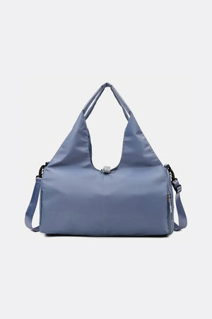 Dusty Blue duffel bag with dual handles and adjustable shoulder strap