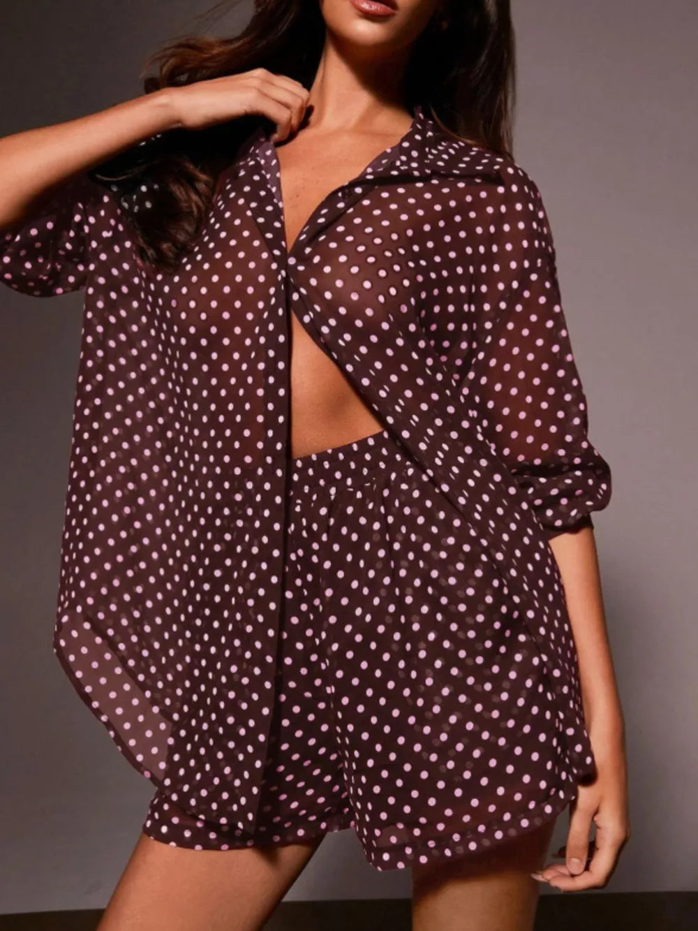 Burgundy sheer polka dot two-piece set with collared button-up shirt and shorts.