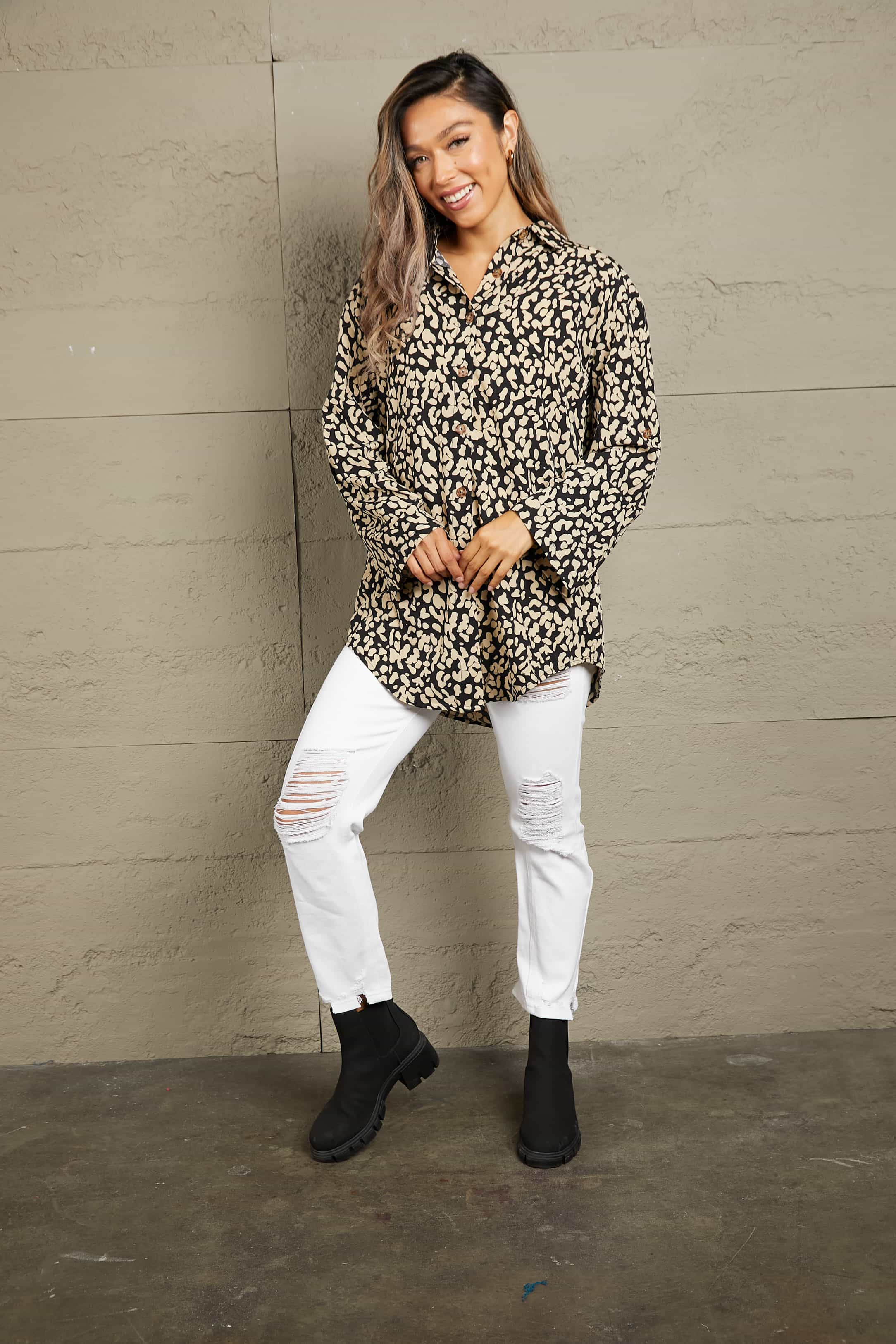 Black abstract spot print oversized shirt with button front and collar.
