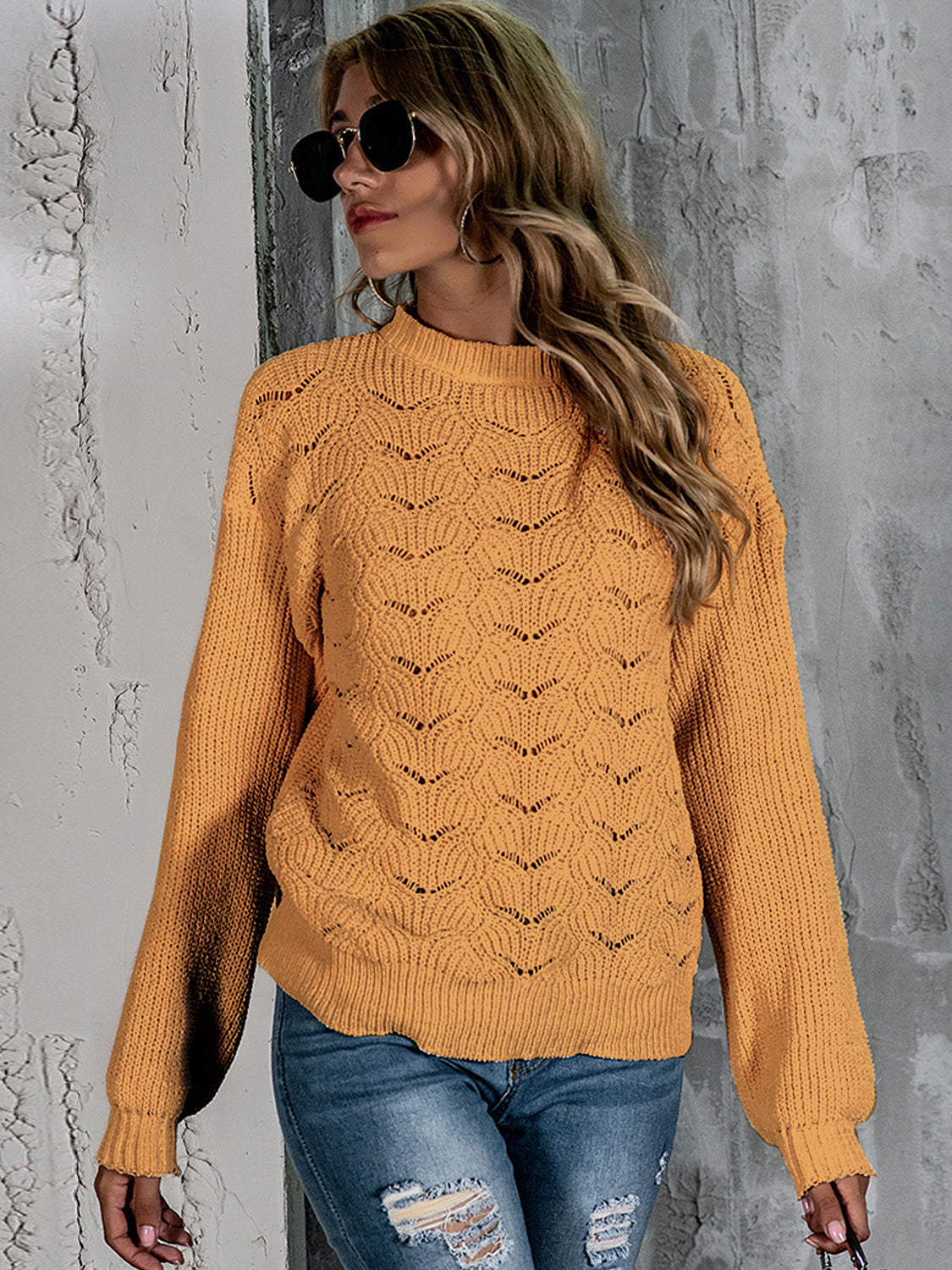 Mustard openwork knit crew neck pullover sweater with balloon sleeves.