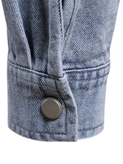 Faded denim utility shirt jacket cuff with button detail, light wash.