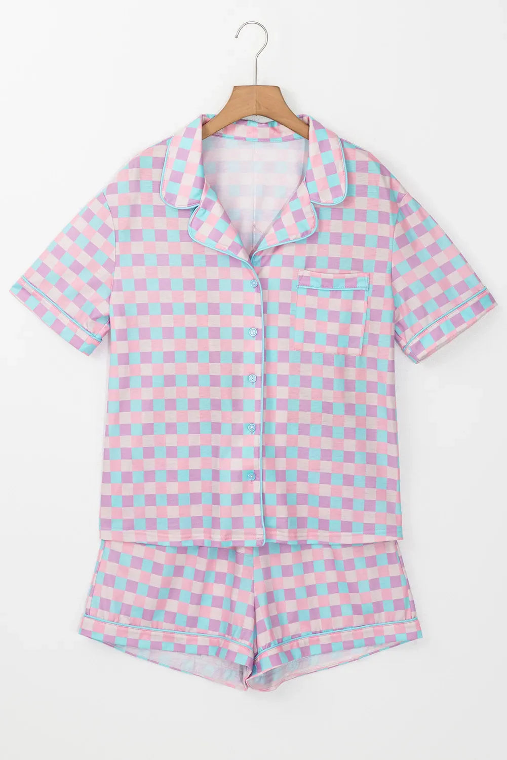 Pastel checkered pajama set with collared short sleeve top and shorts.