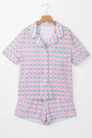 Pastel checkered pajama set with collared short sleeve top and shorts.