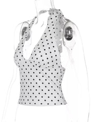 White polka dot halter cami with a tie neck detail