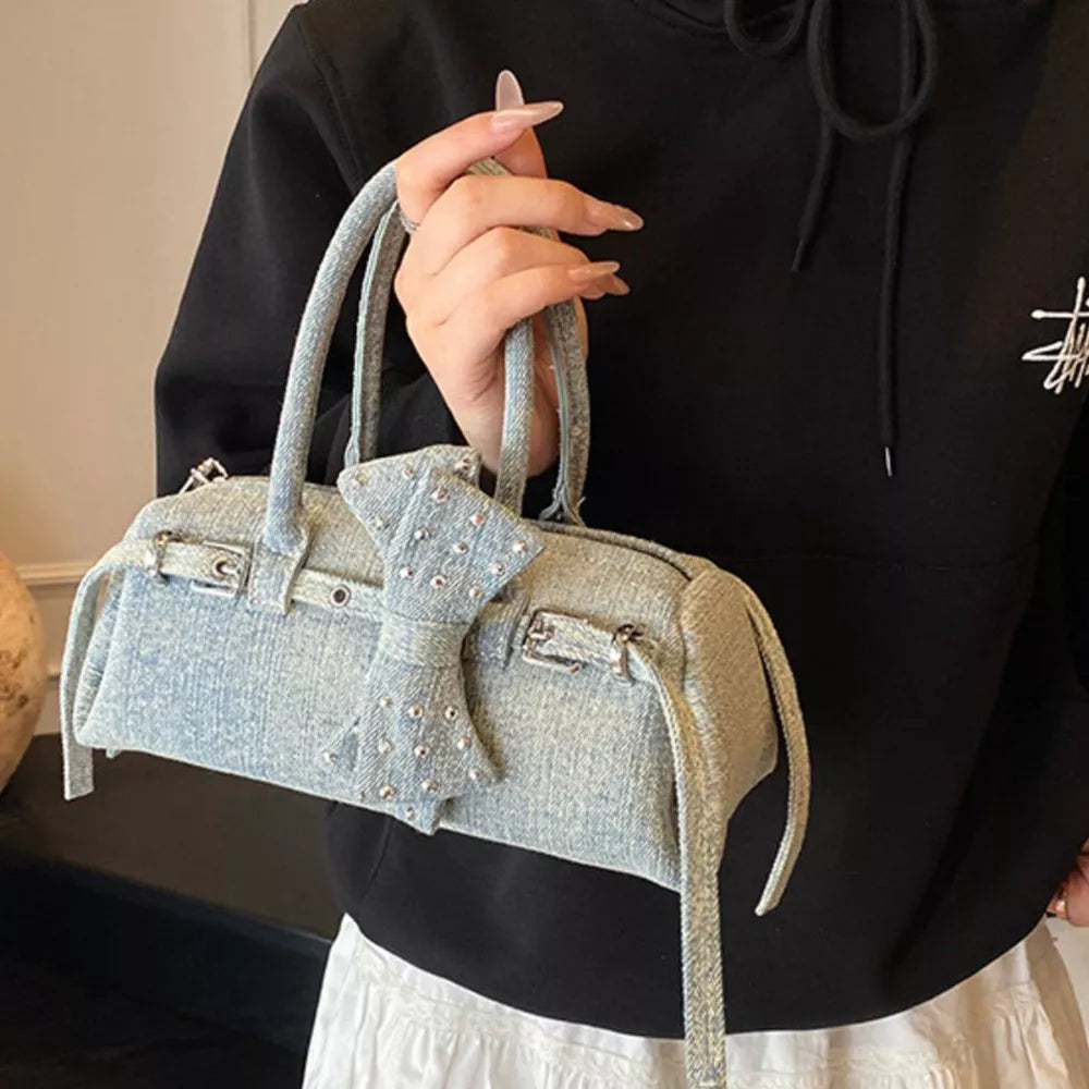 Denim Bow Accent Crossbody Bag in Blue, back view