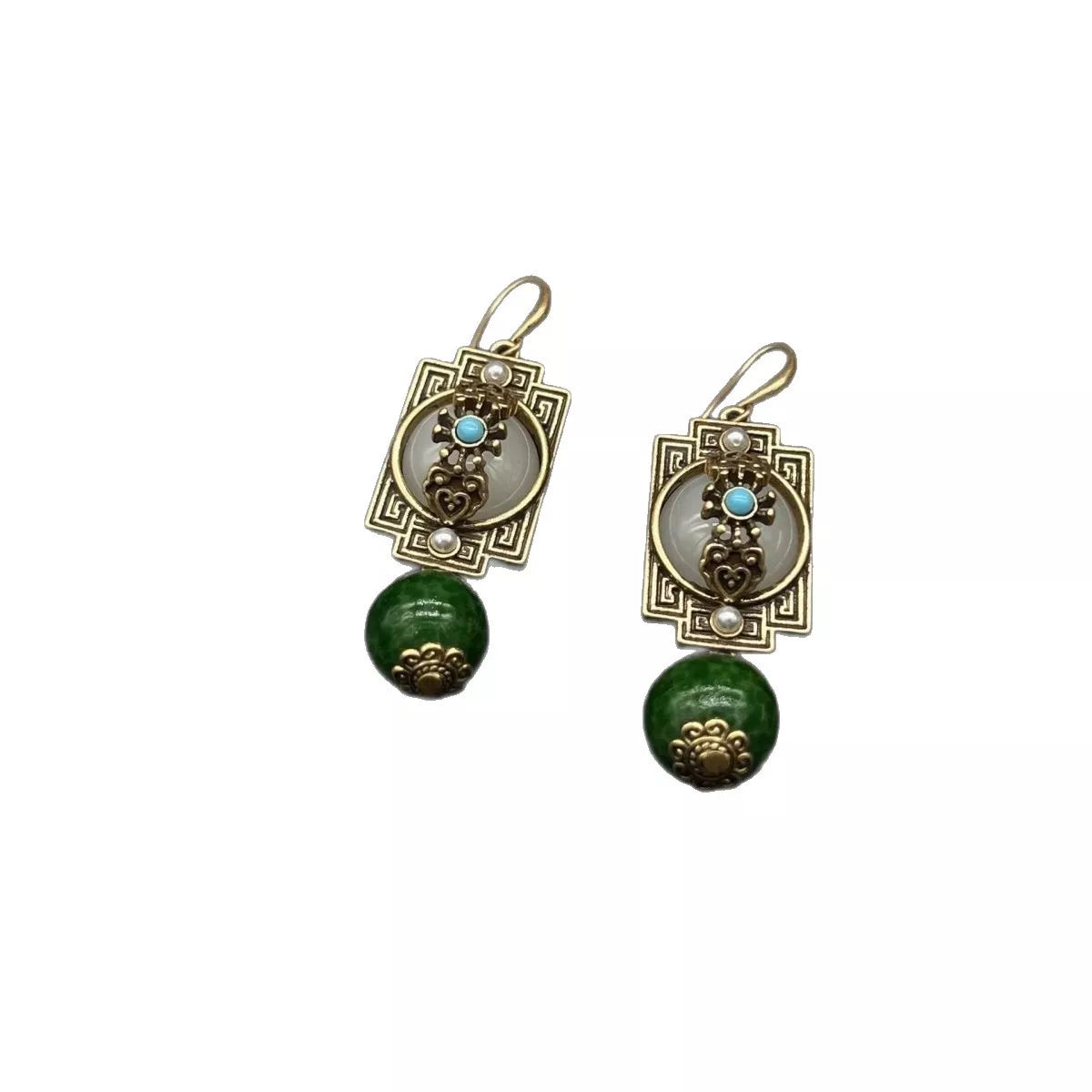 Vintage gold-plated dangle earrings with dark green beads and white accents.