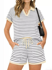 Striped polo shirt and drawstring shorts loungewear set with tan trim and pockets.