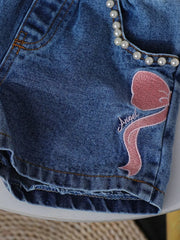 Blue denim shorts with pearl trim and pink bowknot embroidery.