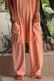 Casual V-neck Short Sleeve Jumpsuit With Pockets in Orange, model styling view