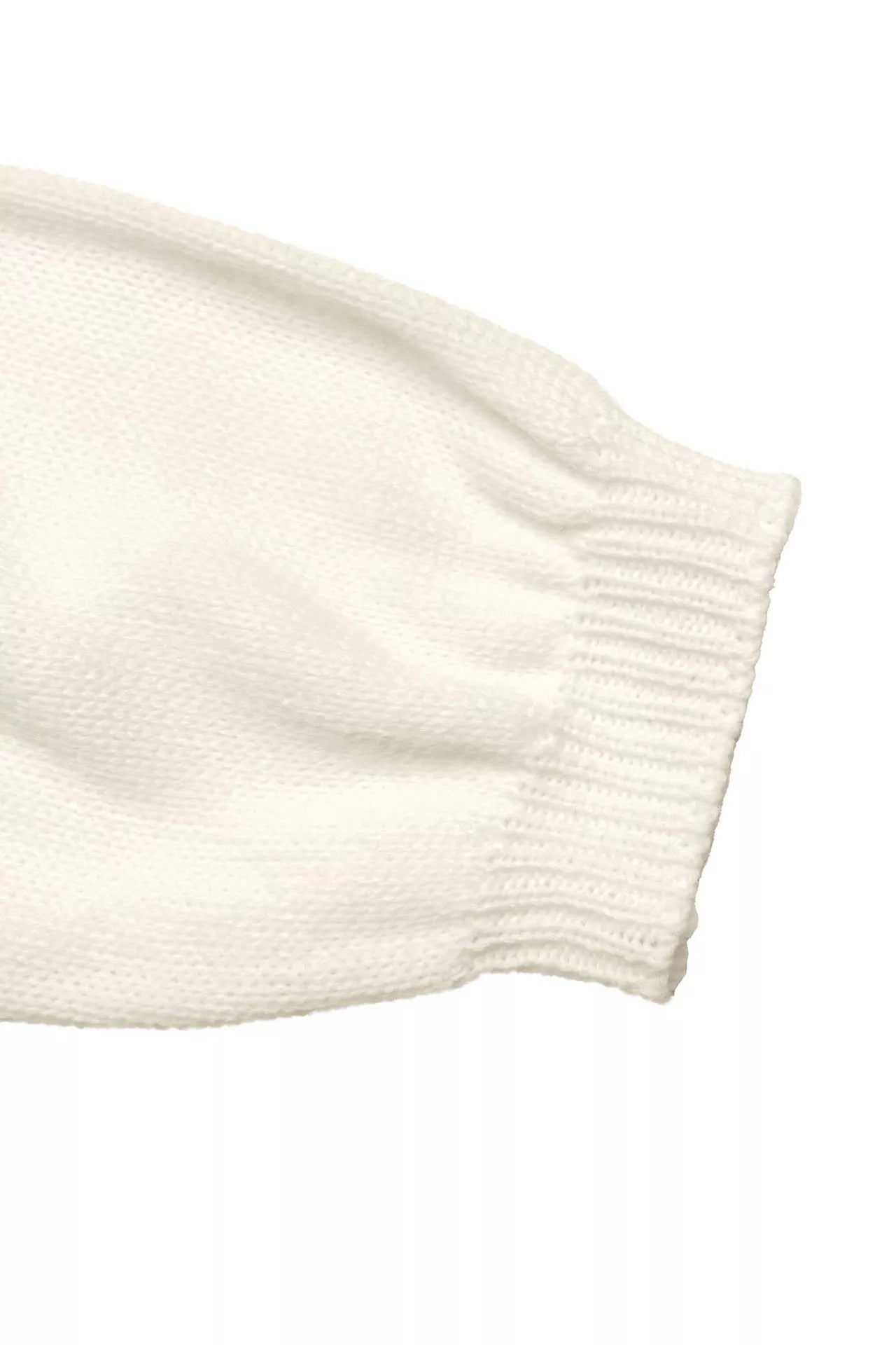 Beige acrylic knit cardigan sleeve with ribbed cuff detail
